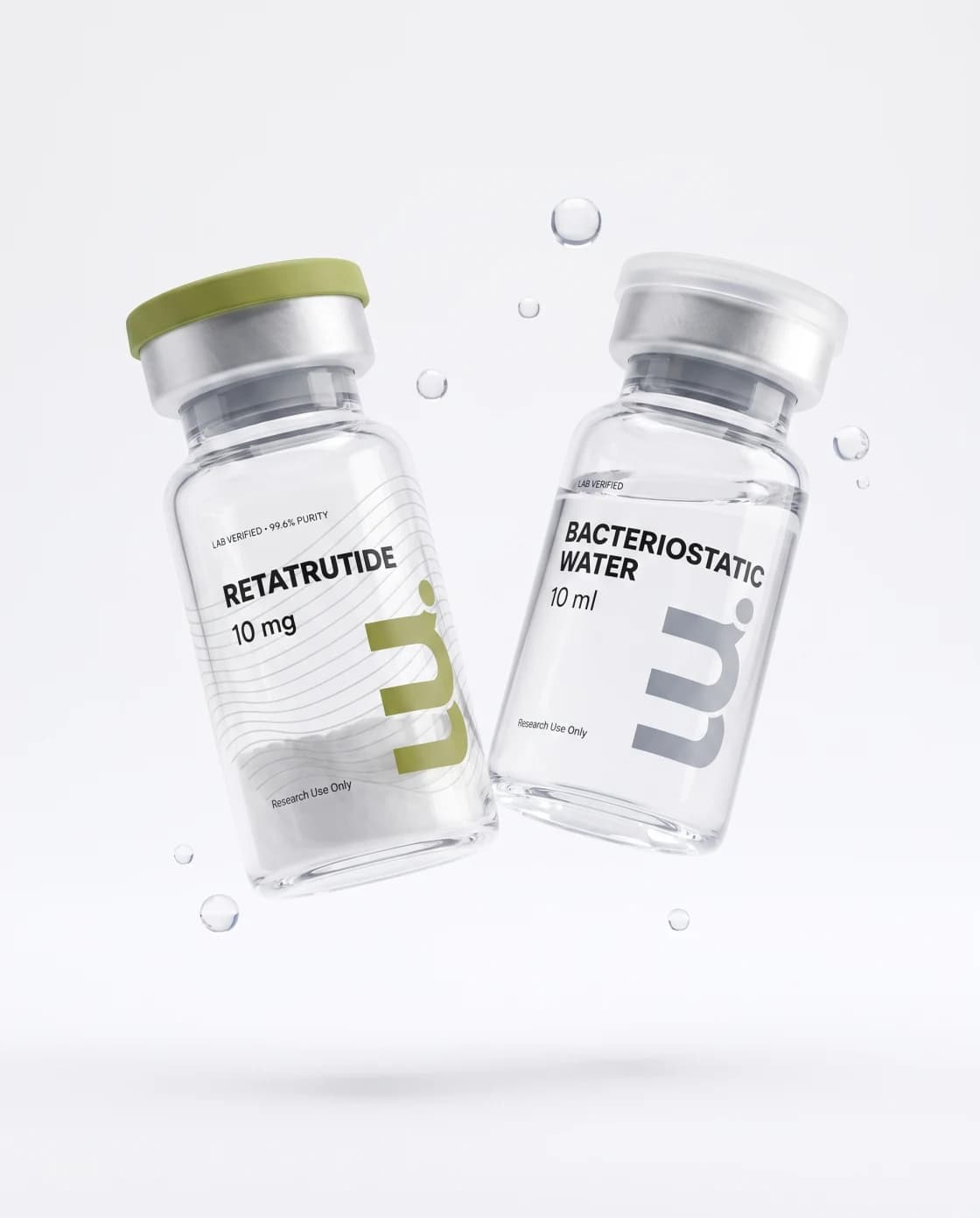 A UU.LIFE peptide vial with unmixed powder beside a bacteriostatic water vial of clear liquid, floating on a studio backdrop.